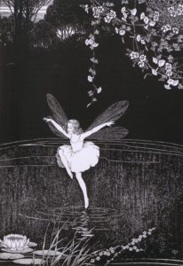 Dragonfly fairy hovering above the water